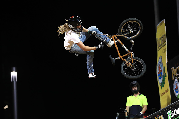X Games Minneapolis Man doing a trick on a BMX bike with Pacifico Banner in background